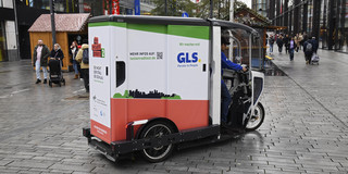GLS delivery car An electric parcel delivery car in a pedestrian area